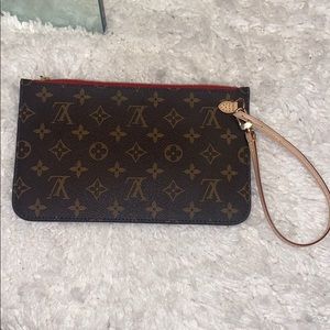 Brand new Louis Vuitton neverfull wristlet